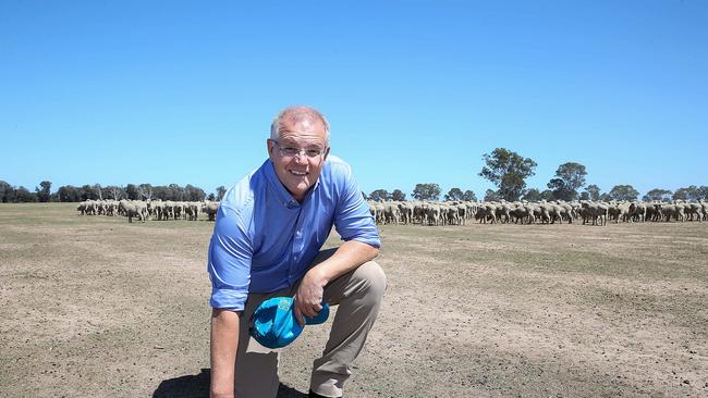 Help needed: Prime Minister Scott Morrison during a visit to drought-affected Briagolong, Gippsland, in February. It’s expected he will announce new drought-assistance measures today. Picture: Ian Currie