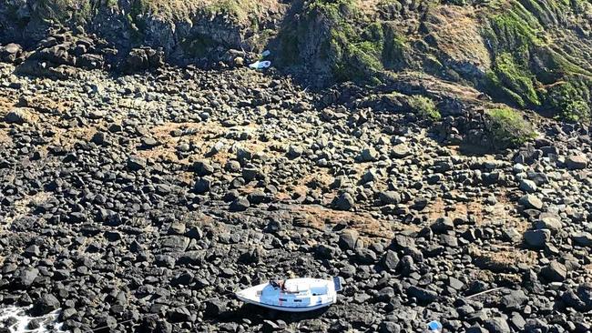 DRAMATIC RESCUE: RACQ Capricorn Rescue search and rescue mission located a 20 foot yacht stuck on Bush Island, north of Stanage Bay, with its two occupants stranded. Picture: RACQ Capricorn Rescue