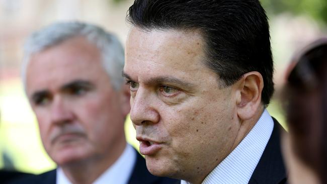 Independent Member for Denison, Andrew Wilkie, left, and Senator Nick Xenophon giving a press conference on the sale of VDL Co. at Parliament House lawns in Hobart. Picture: SAM ROSEWARNE