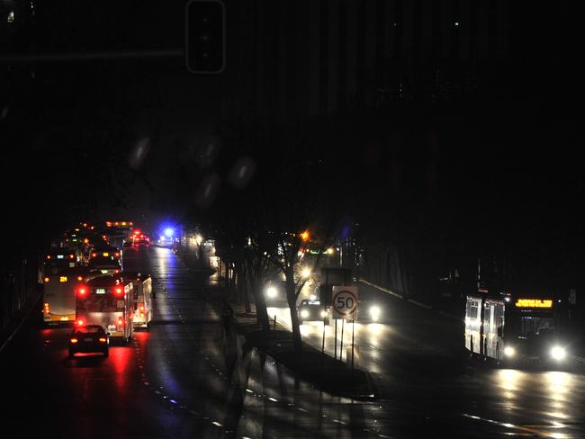 Adelaide CBD was plunged into total darkness when the power network went down across the entire state last night. Picture: David Mariuz