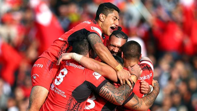 Tonga celebrates during the 2017 Rugby League World Cup match between the New Zealand Kiwis and Tonga at Waikato Stadium.