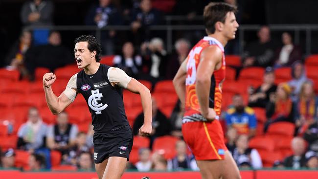 Jack Silvagni celebrates after kicking a goal against Gold Coast.