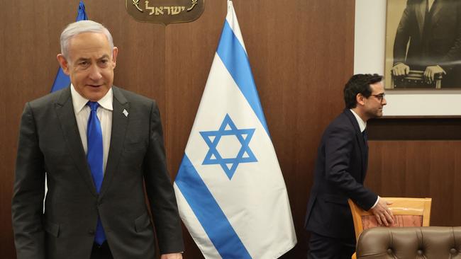 Israeli Prime Minister Benjamin Netanyahu takes a seat before his meeting with France's Foreign Minister, Stephane Sejourne in Jerusalem on February 5. Picture: AFP