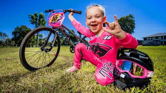 Karen-Rose Dailly with her bike and “55’’ family number. Picture: Nigel Hallett