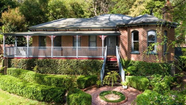 A period-style three-bedroom house at 2 Sandells Rd, Tecoma, boasts ceiling roses, vintage door handles and leadlight accents. It has a $1.05m-$1.155m price guide.