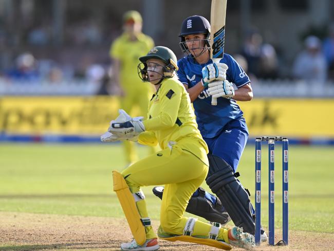 BRISTOL, ENGLAND - JULY 12: Kate Cross of England bats watched by Australia wicketkeeper Alyssa Healy during the Women's Ashes 1st We Got Game ODI match between England and Australia at Seat Unique Stadium on July 12, 2023 in Bristol, England. (Photo by Gareth Copley/Getty Images)