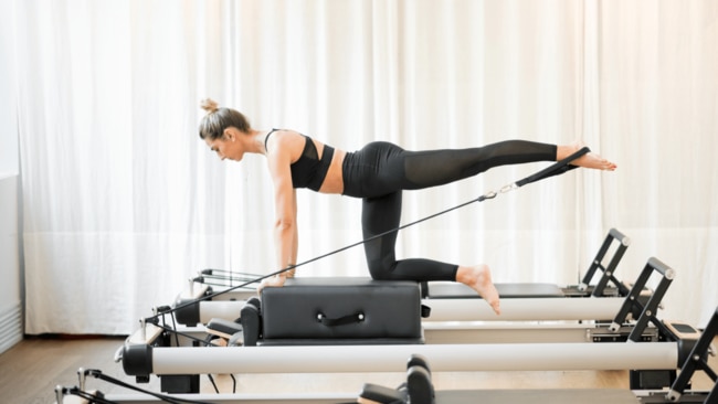 The reformer machine offers a diverse range of exercise sequences. Image: iStock