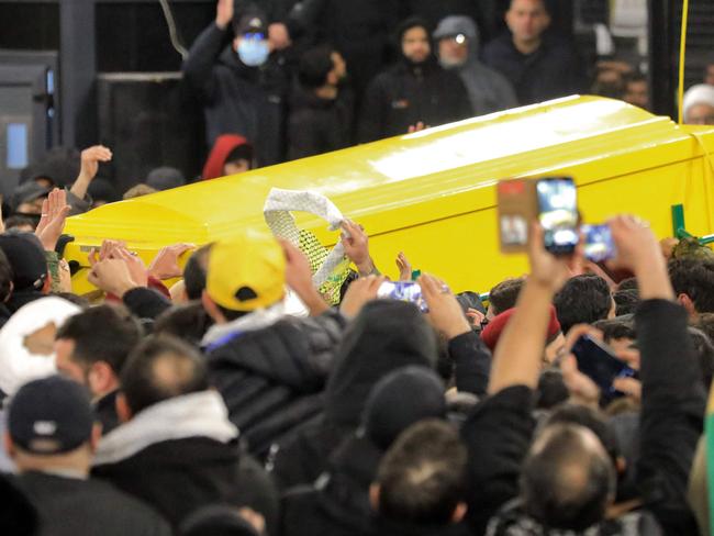 Mourners carry the coffin of Hezbollah’s slain leader Hassan Nasrallah upon arrival at the burial place during his funeral in Beirut's southern suburbs. Picture: AFP