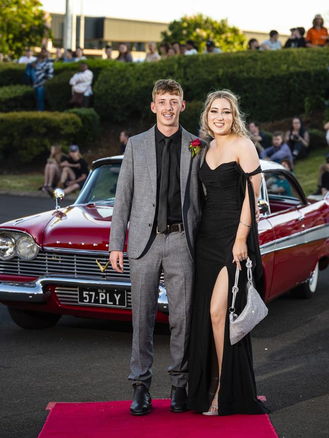 Jimmy Potter and Jasmine Cliffe arrive at Harristown State High School formal at Highfields Cultural Centre, Friday, November 18, 2022. Picture: Kevin Farmer