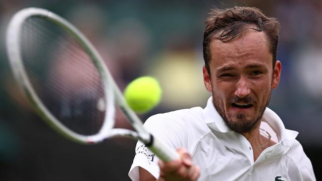 Russia's Daniil Medvedev returns against Italy's Jannik Sinner during their men's singles quarter-final tennis match. Picture: AFP