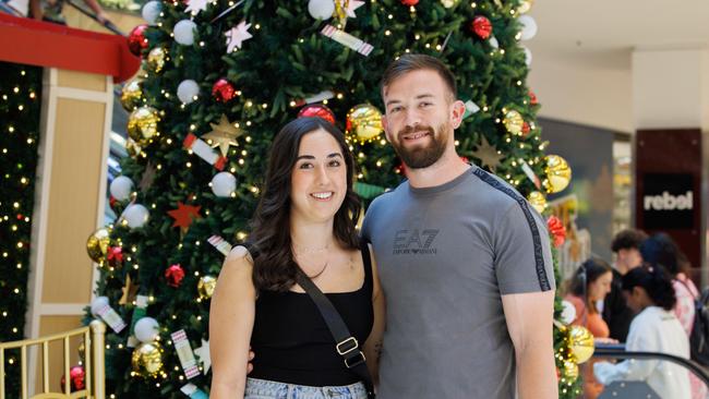 Last minute shoppers Alicia Garcia- Rojas and Alex Palmer at Westfield Parramatta.