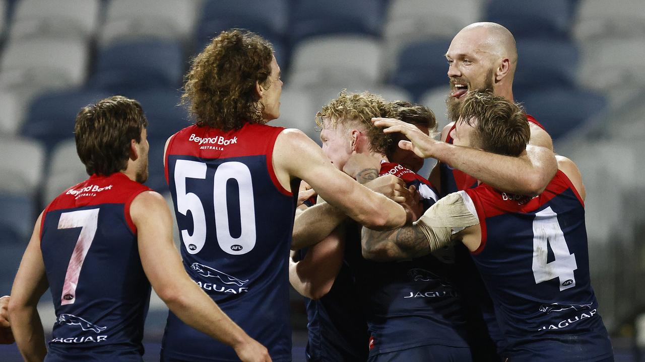 The Demons flock to Max Gawn after his matchwinning goal after the siren. Picture: Daniel Pockett/Getty Images