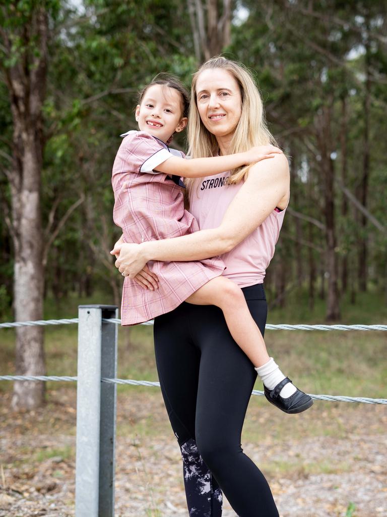 Michelle Moore, 45, with daughter Mia, 6, at Riverbank Public School. Photo: Tom Parrish