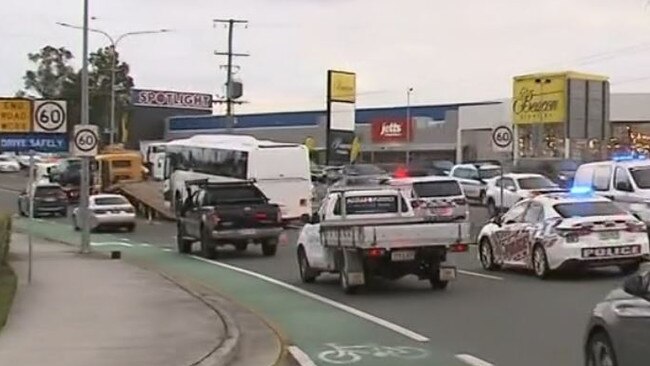 A tow truck removes the bus from the scene of the accident. Picture: Nine Gold Coast News.