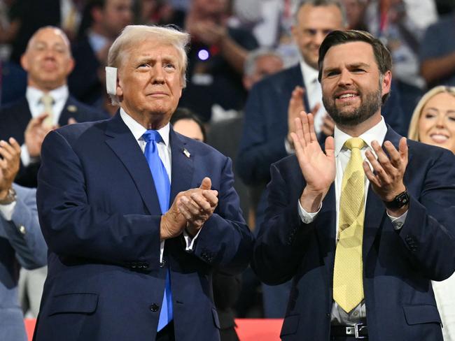 US former President and 2024 Republican presidential candidate Donald Trump and US Senator from Ohio and 2024 Republican vice presidential candidate J.D. Vance attend the second day of the 2024 Republican National Convention at the Fiserv Forum in Milwaukee, Wisconsin, July 16, 2024. Days after he survived an assassination attempt Donald Trump won formal nomination as the Republican presidential candidate and picked right-wing loyalist J.D. Vance for running mate, kicking off a triumphalist party convention in the wake of last weekend's failed assassination attempt. (Photo by ANGELA WEISS / AFP)