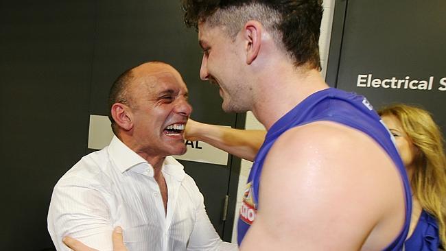 Bulldogs great Tony Liberatore hugs his son Tom. Picture: Michael Klein