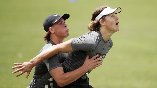 Geelong Falcons’ Blake Reid and then Bendigo Pioneer Jack Ginnivan during the AFL Draft Victoria Training Day in December, 2020. Picture: Dylan Burns/AFL Photos via Getty Images)