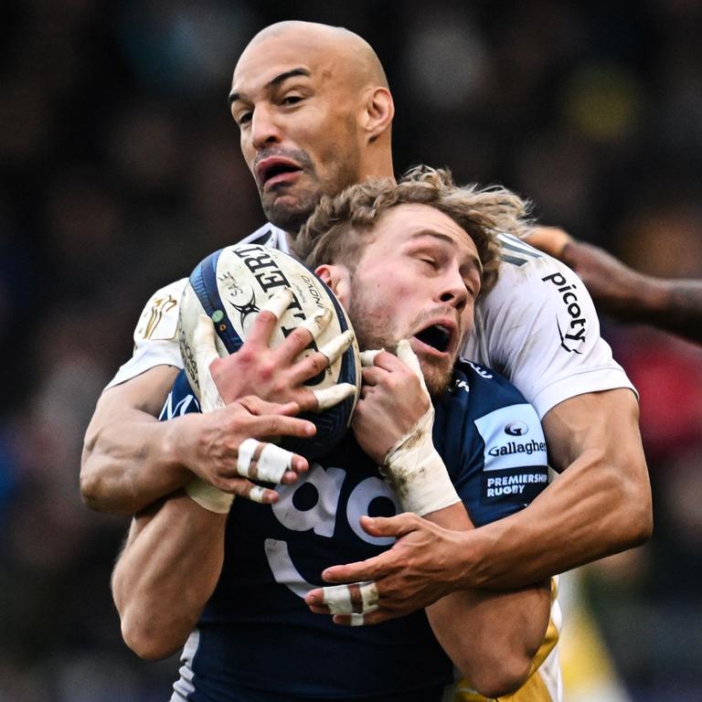 Dillyn Leyds of La Rochelle tackles Gus Warr in the Champions Cup match against Sale Sharks in Salford, England. Picture: Paul Ellis/AFP