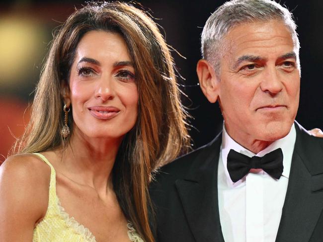 Actor George Clooney and his wife Amal Clooney attend the red carpet of the movie "Wolfs" presented out of competition during the 81st International Venice Film Festival at Venice Lido, on September 1, 2024. (Photo by Alberto PIZZOLI / AFP)