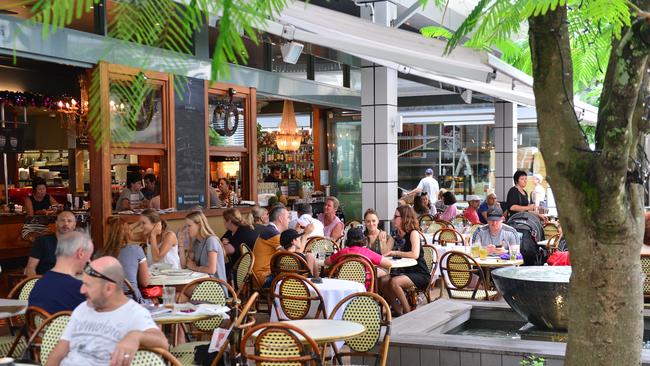 Tourists enjoying the hospitality on Hastings Street, Noosa Heads at Aromas.