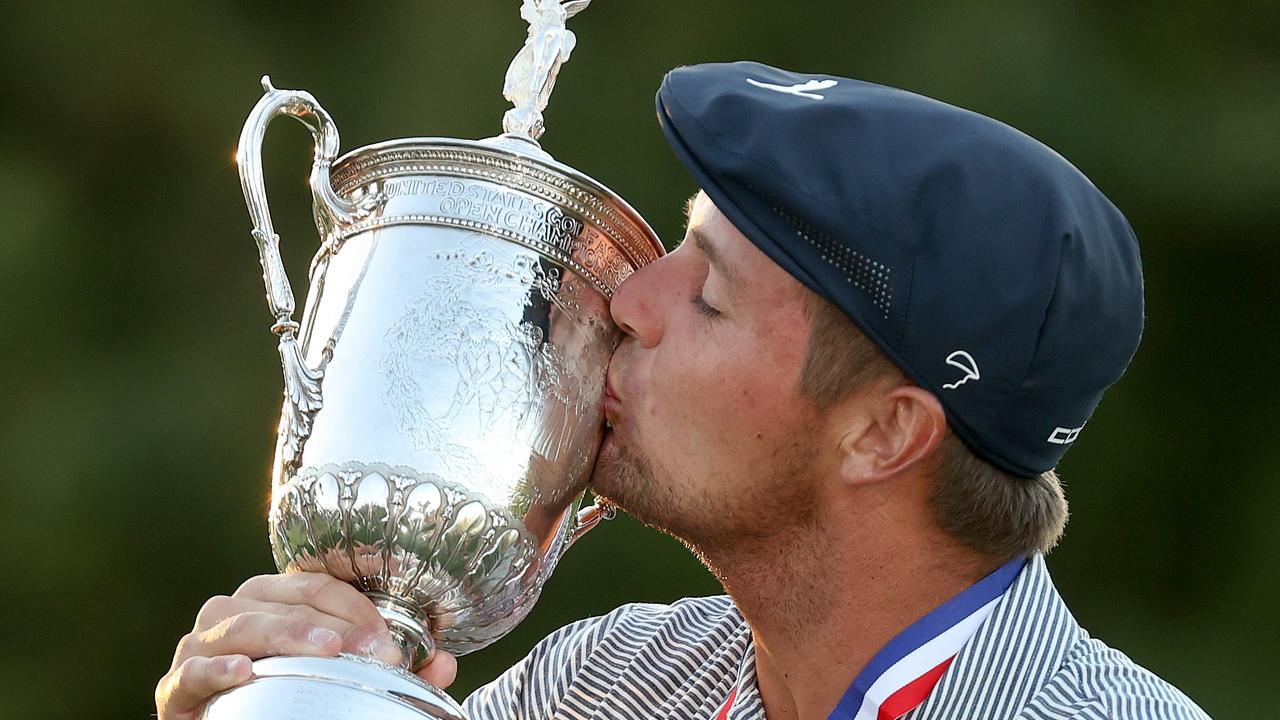 Bryson DeChambeau kisses the championship trophy after winning the 120th US Open Championship. Picture: Gregory Shamus/Getty Images