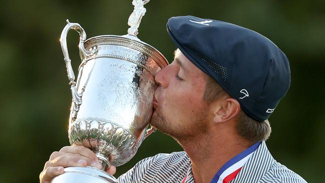 Bryson DeChambeau kisses the championship trophy after winning the 120th US Open Championship. Picture: Gregory Shamus/Getty Images