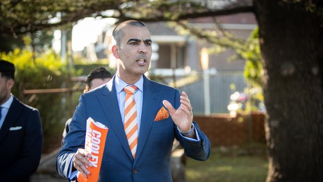 The auction of 12 Ian Parade, Concord, on Saturday as auctioneer Michael Garofolo brings down the gavel on the sale. (Picture by Julian Andrews).