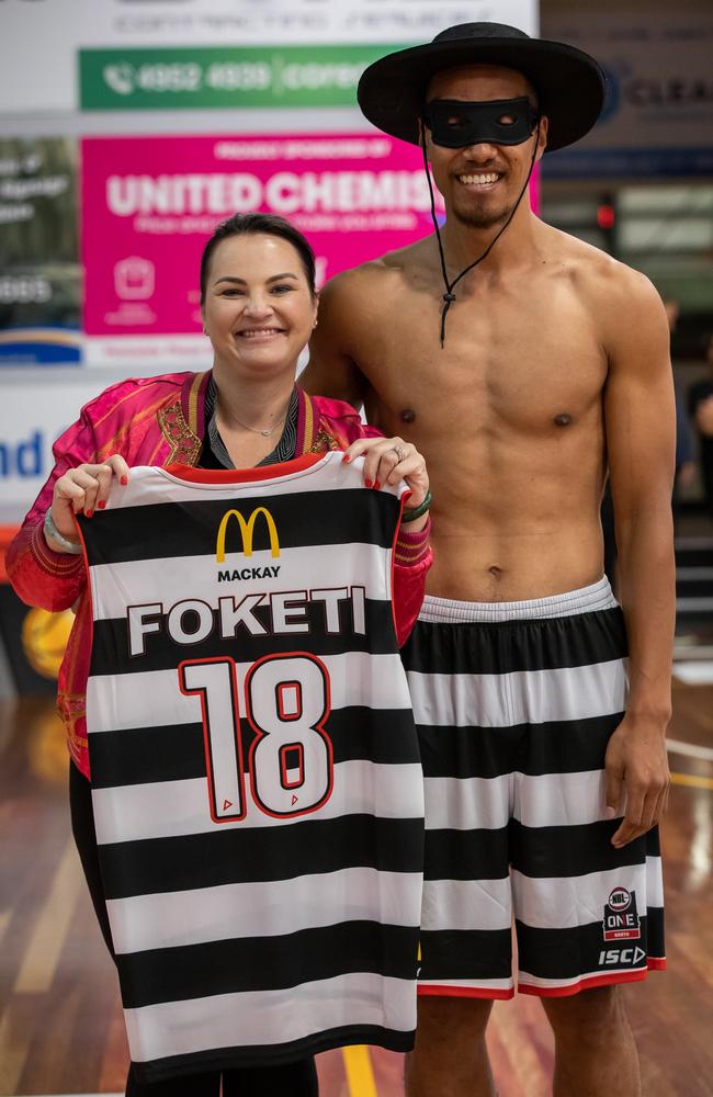 McDonald’s Mackay’s Niki Ramsay (left) won the auction for Viliami Foketi's match-worn jersey after Mackay Meteors defeated Cairns in the NBL1 North last month. Mackay basketball fans showed their love and support for their community of hoopers last month with more than $30,000 raised in the post-match singlet auction. The Hamburglar-themed singlets were a part of a McDonald’s initiative to raise money for the new Ronald McDonald Family Room at Mackay Base Hospital.