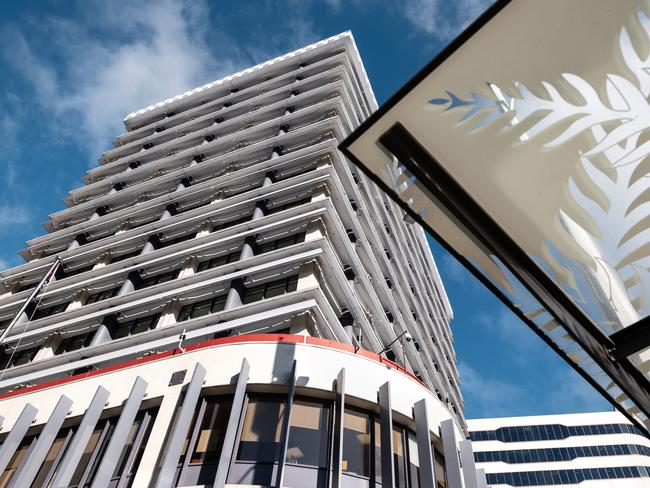 The Reserve Bank of New Zealand (RBNZ) headquarters, left, stands in Wellington, New Zealand, on Thursday, Aug. 9, 2018. New Zealand's central bank said it expects to keep interest rates at a record low for another two years as the outlook for economic growth weakens. Photographer: Birgit Krippner/Bloomberg