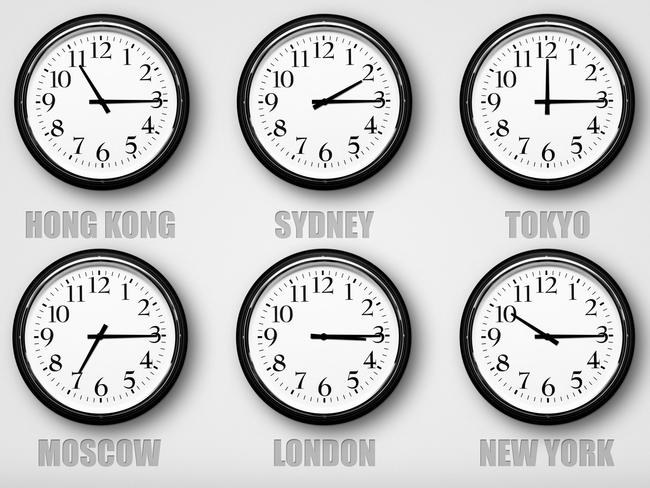 Clocks on wall with time zone of different country in modern room.