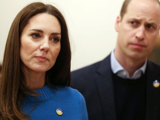 The royal couple were visibly moved by the visit. Picture: AFP