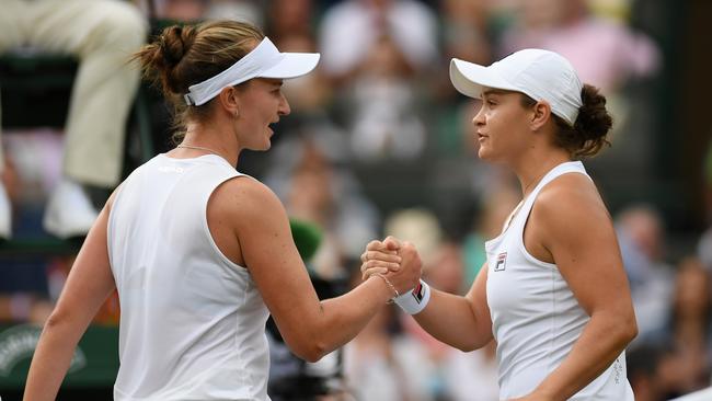 Ashleigh Barty of Australia and Barbora Krejcikova of The Czech Republic shake hands at the net after their Ladies' Singles Fourth Round match.