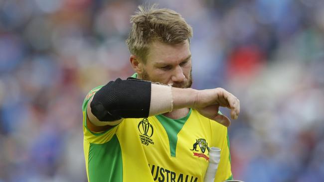 LONDON, ENGLAND - JUNE 09: David Warner of Australia reacts after getting caught out during the Group Stage match of the ICC Cricket World Cup 2019 between India and Australia at The Oval on June 9, 2019 in London, England. (Photo by Henry Browne/Getty Images)