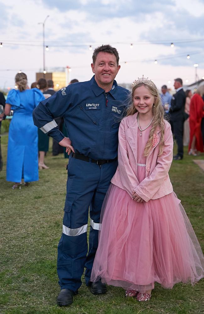 LifeFlight past patient Bellah Free, 11, with LifeFlight Chief Pilot Dave Bashir at the Toowoomba Gala. Dave was Bellah’s pilot in her medical emergency eight years ago.