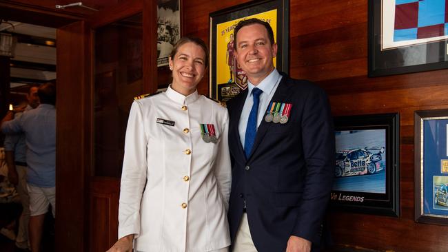 LCDR Anthea Baczkowski and Mathew Tickner as ADF personnel crowd into Darwin pubs to celebrate Anzac Day. Picture: Pema Tamang Pakhrin