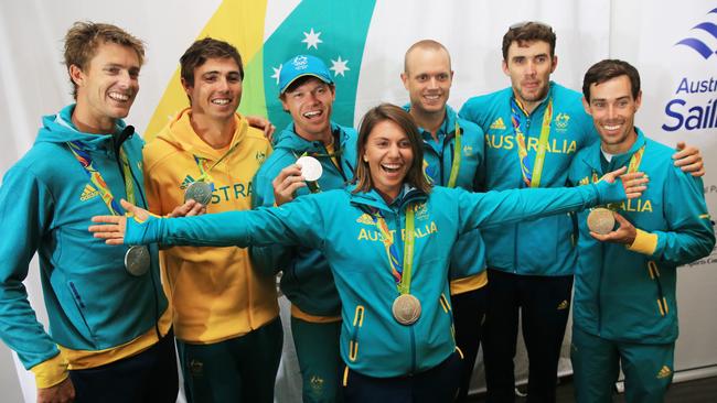 Medalists Will Ryan, Iain Jensen, Nathan Outteridge, Lisa Darmanin, Tom Burton, Jason Waterhouse and Mat Belcher after the Rio Olympics.