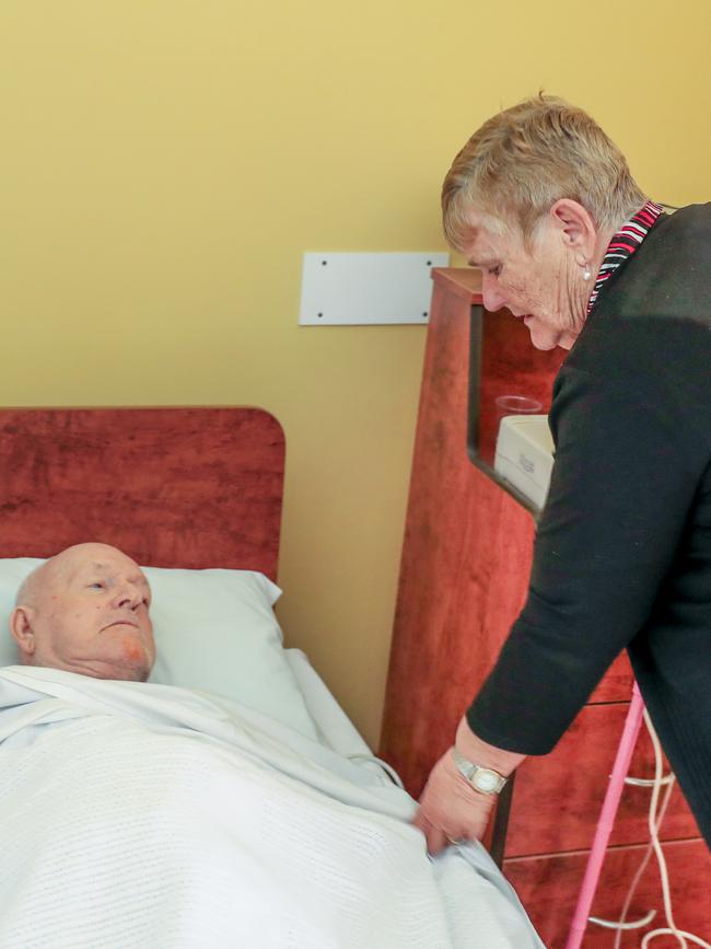 Lorraine Cook with husband John at a Gold Coast nursing home after he was evacuated from Earle Haven on Thursday night. Picture: Tim Marsden/AAP