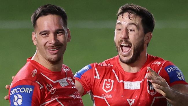 GOSFORD, AUSTRALIA - JULY 02: Corey Norman of the Dragons celebrates the win from his field goal with his team mates during the round 16 NRL match between New Zealand Warriors and the St George Illawarra Dragons at Central Coast Stadium, on July 02, 2021, in Gosford, Australia. (Photo by Ashley Feder/Getty Images)