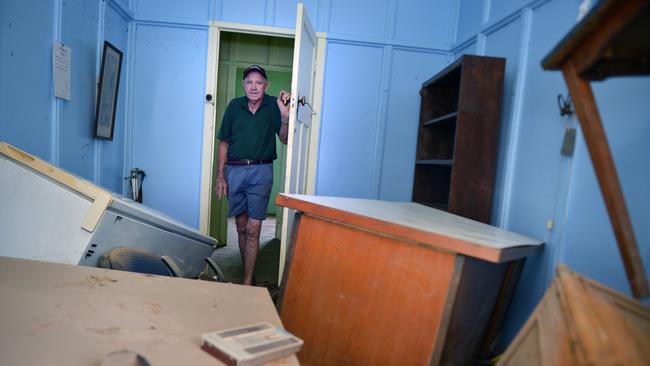 Blill Clark Coolee owner of Woolooga pub cleaning out after the flood in February 2013 . Photo Renee Pilcher / The Gympie Times