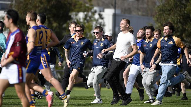 Sunshine supporters took to the field.