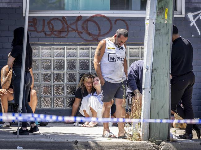 Emotional friends and family of Abdulrahim gather at the site of the shooting. Picture: Jake Nowakowski