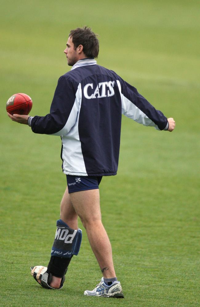 An injured Matthew Egan at training before the 2007 Grand Final.