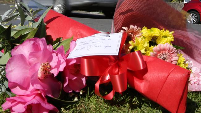 Flowers and cards left at the scene where Mrs Deall was killed on Saturday night. Picture: Mark Scott