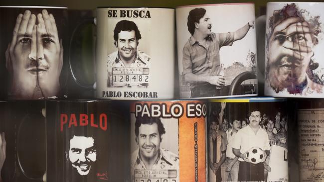 View of souvenirs with the image of the late Colombian drug lord Pablo Escobar for sale in a hairdresser's at Pablo Escobar neighbourhood, on November 28, 2018. Picture: AFP