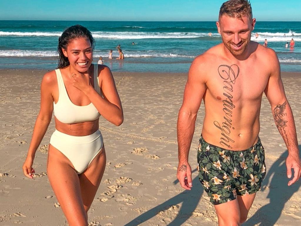 Bryce Cartwright with partner Shanelle Cartwright. Ms Cartwright has reportedly had her Instagram affected by changes made to thwart anti-vaxxer disinformation. 