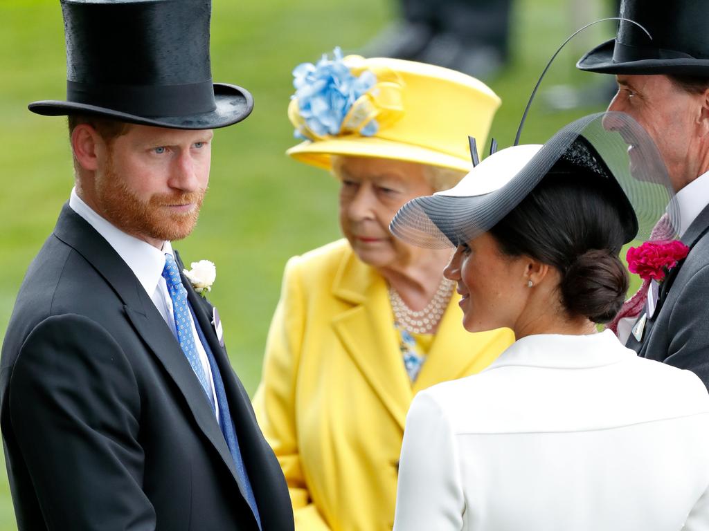 Prince Harry, Duke of Sussex, Meghan, Duchess of Sussex and Queen Elizabeth II attend day 1 of Royal Ascot at Ascot Racecourse on June 19, 2018. Picture: Max Mumby/Indigo/Getty Images