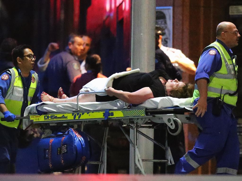 Louisa Hope is taken out on a stretcher after sustaining a gunshot wound to the foot. Picture: Getty Images