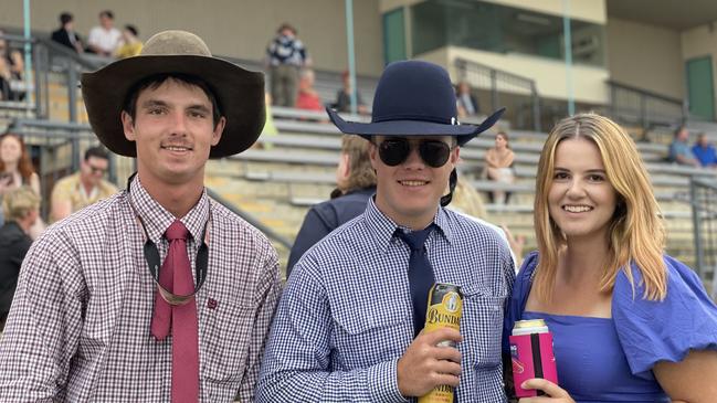 Mason Collett, Will Britten and Tilly Michelle at the Gympie races on Saturday November 25, 2023.