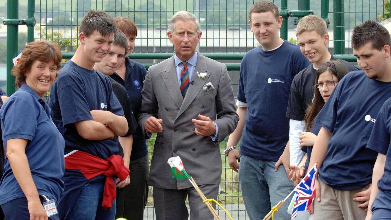 King Charles attempts a shot in a catapult game during a Prince's Trust visit to Cymru Activity Centre at Pembroke Dock in 2006. Picture: Anwar Hussein Collection / ROTA / Wire Image