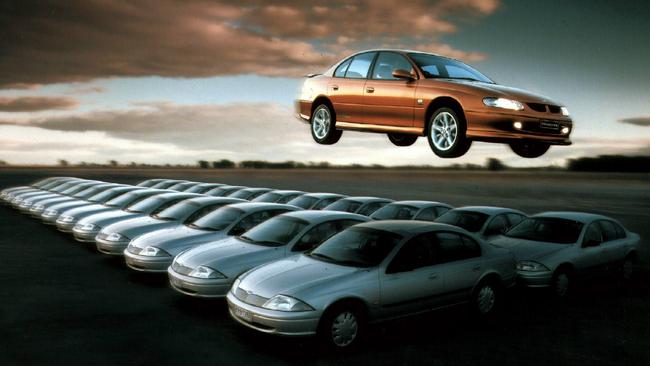 The Commodore VT was a bestseller (depicted here jumping a row of Ford Falcons), but did the success blind Holden to a changing market? Picture: Supplied